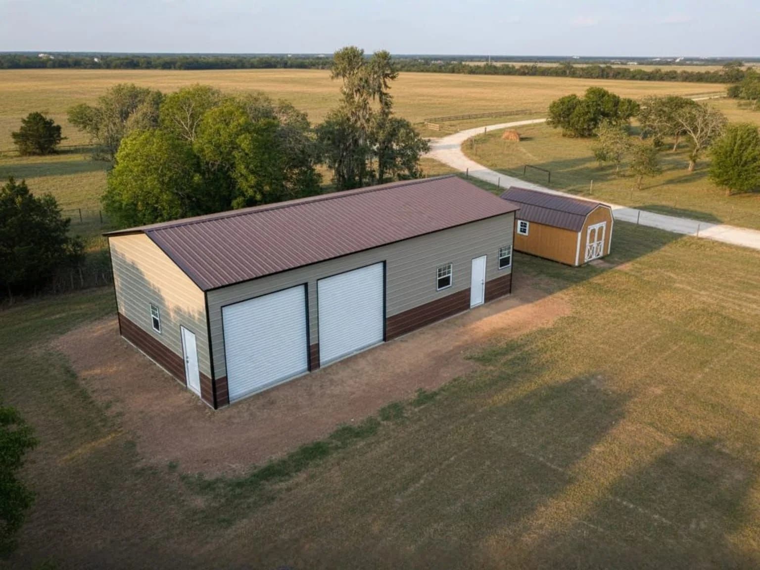 Aerial view of a North Texas property with shed, steel building, and deck